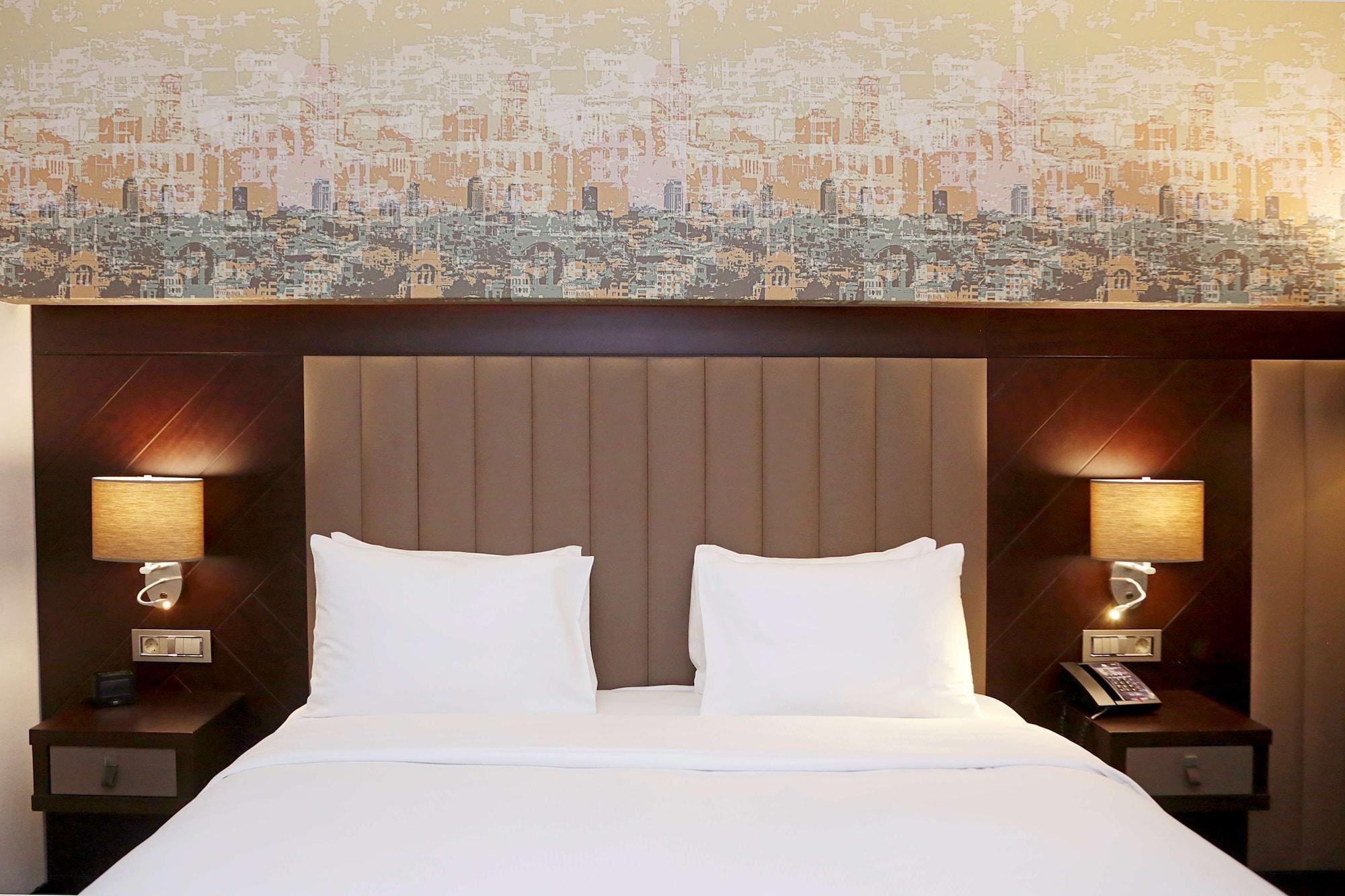Готель Doubletree By Hilton Istanbul Umraniye Екстер'єр фото A bedroom at the hotel